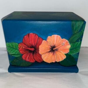Coral and Red Hibiscus over teal blue cremation urn